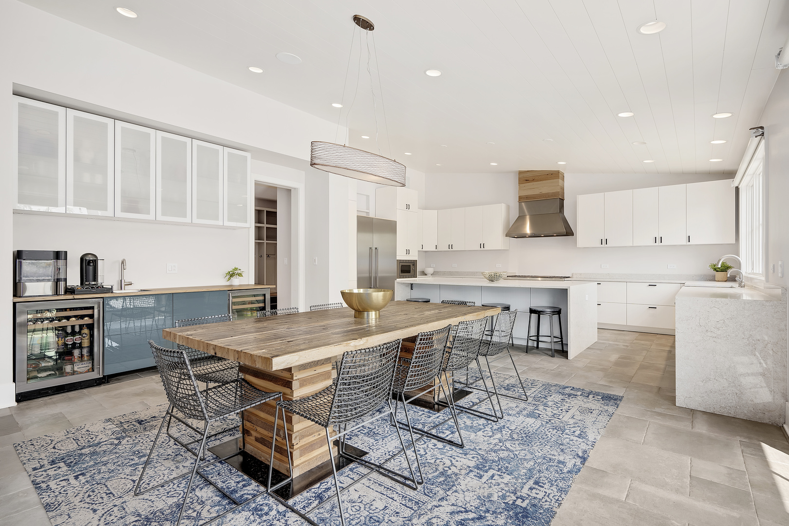 4333 Roslyn Road Downers Grove, IL 60515 - Photo 6 of 67 a large kitchen with a table and chairs in it