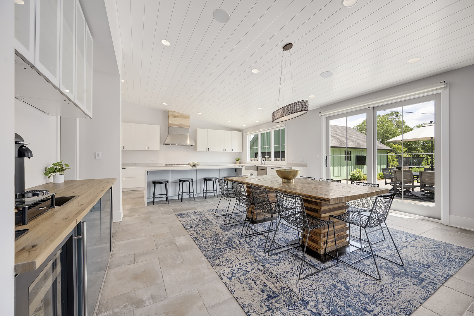 4333 Roslyn Road Downers Grove, IL 60515 - Photo 8 of 67 a dining room with furniture and a floor to ceiling window