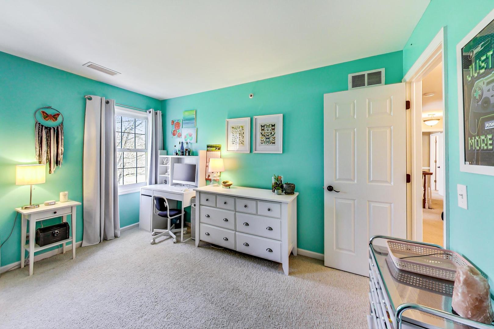 5258 Hilltop Road Long Grove, IL 60047 - Photo 28 of 50 a room with furniture and a dresser