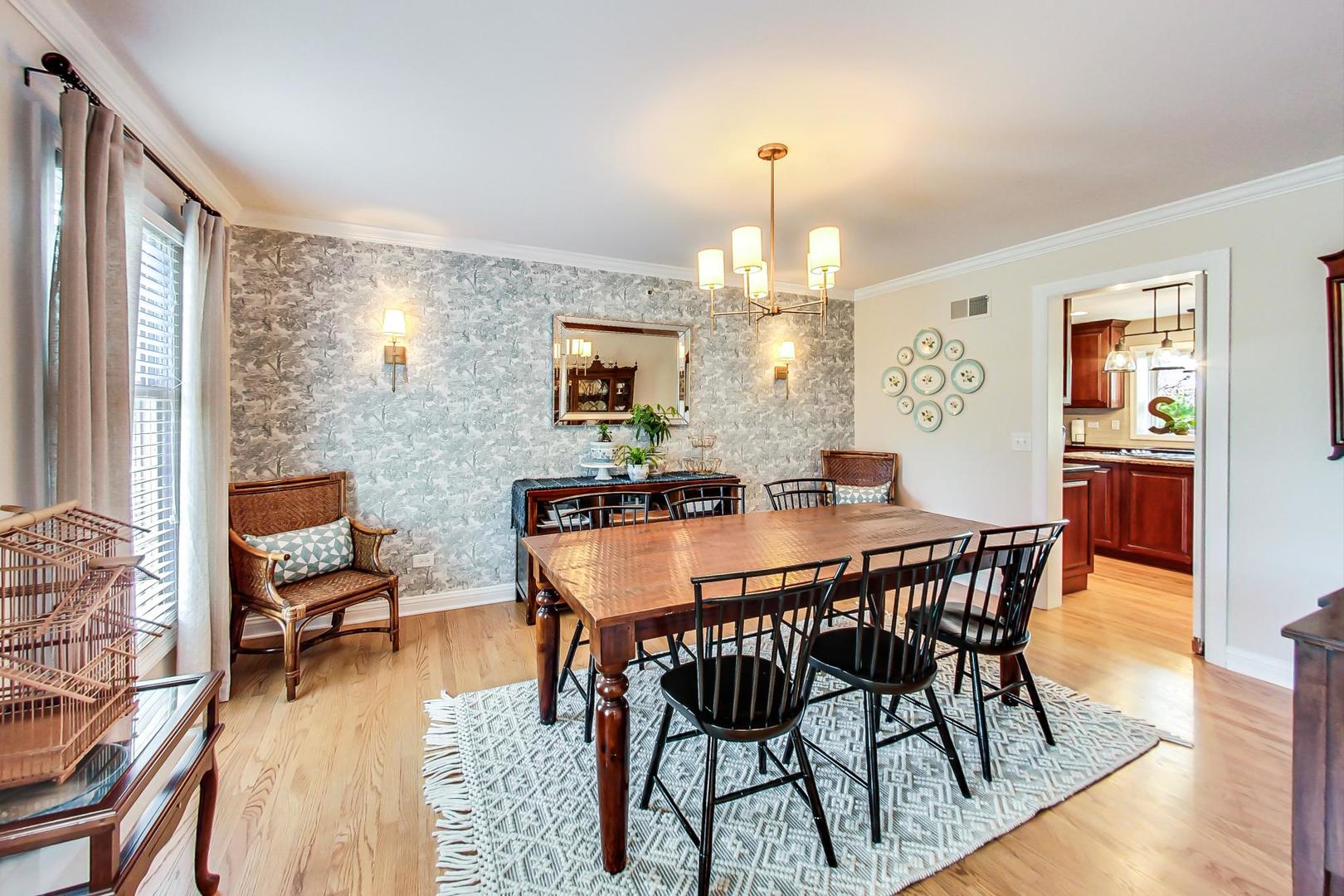 5258 Hilltop Road Long Grove, IL 60047 - Photo 9 of 50 a view of a dining room with furniture and wooden floor