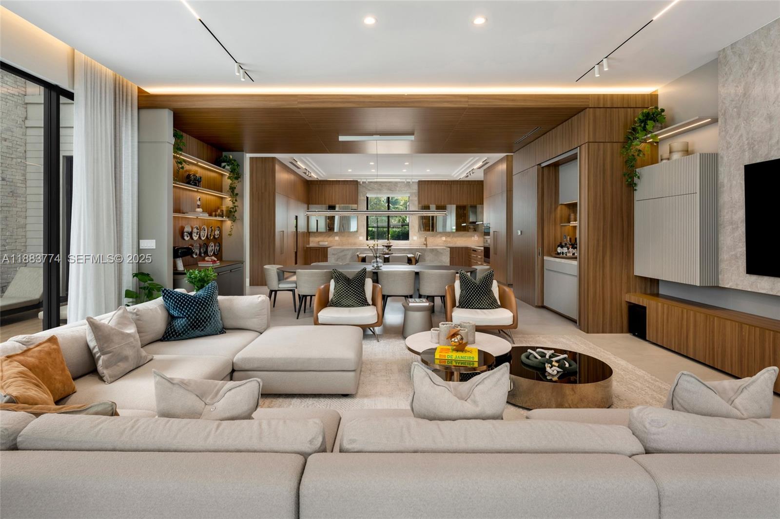 13120 Old Cutler Road Pinecrest, FL 33156 - Photo 11 of 58 a living room with furniture and a large window