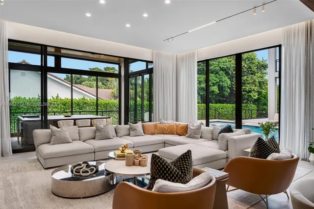 a kitchen with a stove a sink and a table