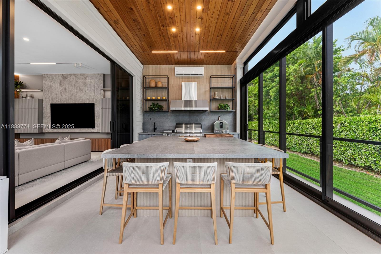 13120 Old Cutler Road Pinecrest, FL 33156 - Photo 16 of 58 a view of a dining room with furniture window and outside view