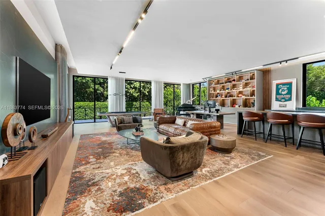 a kitchen with a table and chairs in it