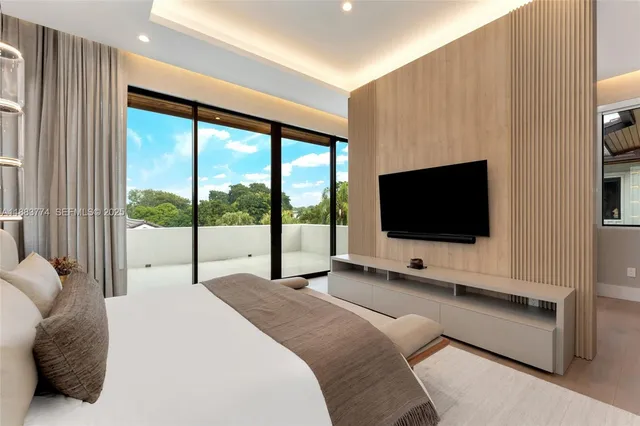 a bathroom with a bathtub and a sink