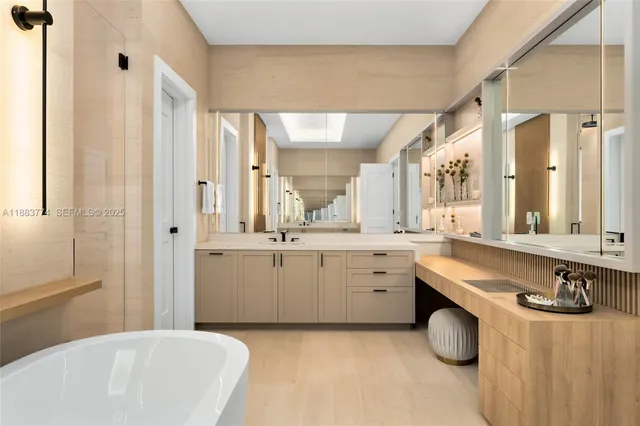 a kitchen with cabinets and a view of living room