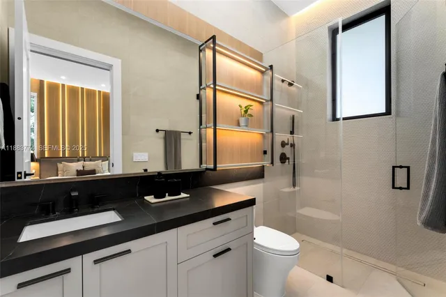 a view of a house with backyard porch and sitting area