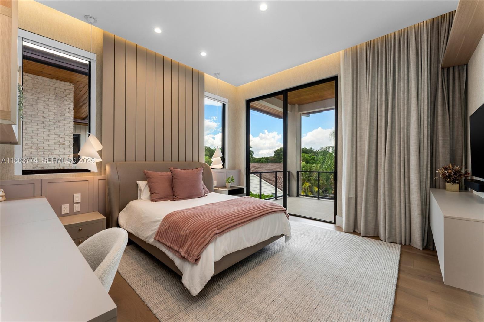 13120 Old Cutler Road Pinecrest, FL 33156 - Photo 40 of 58 a bedroom with a bed and a large window