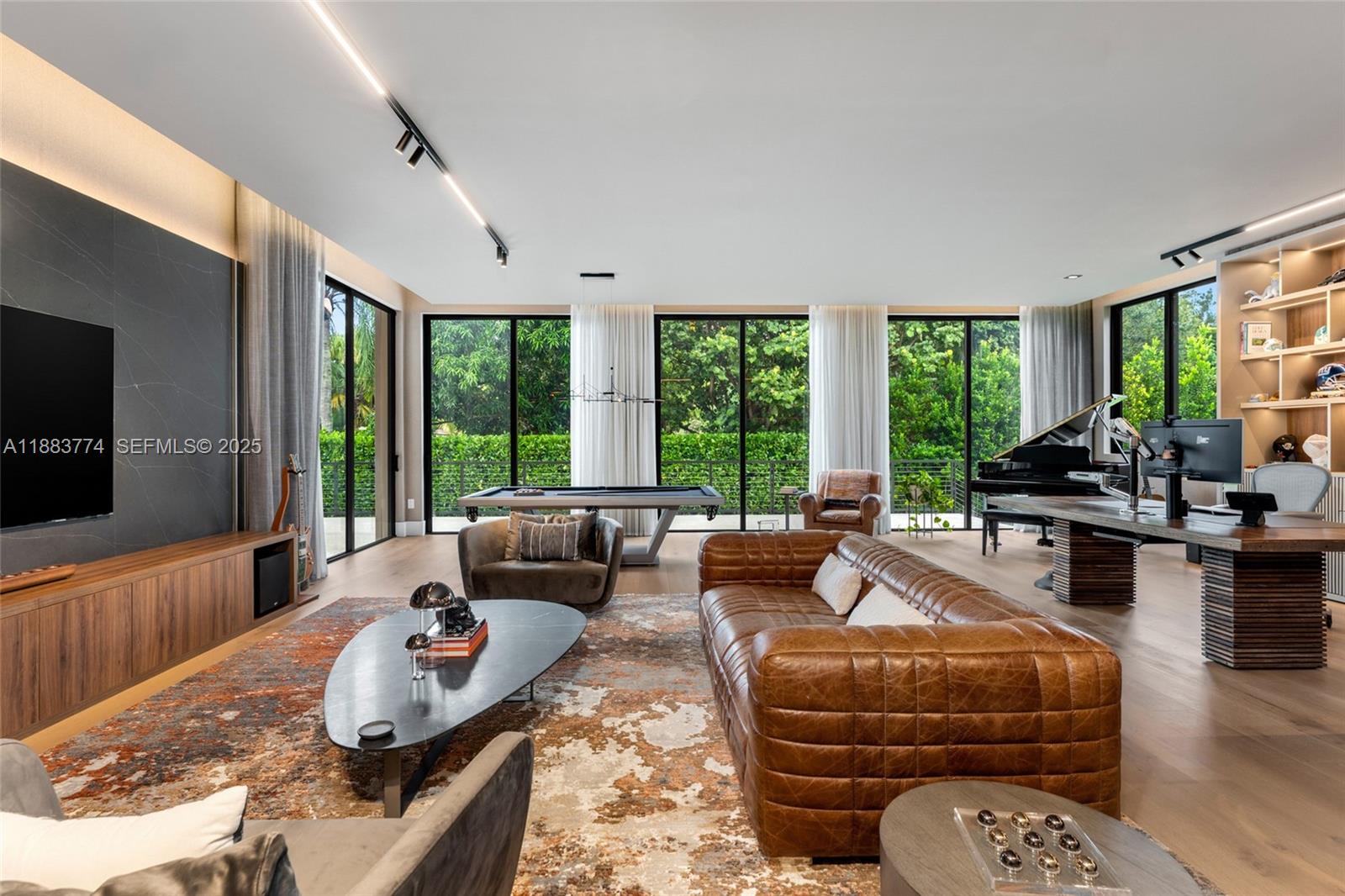 13120 Old Cutler Road Pinecrest, FL 33156 - Photo 4 of 58 a living room with furniture and a large window