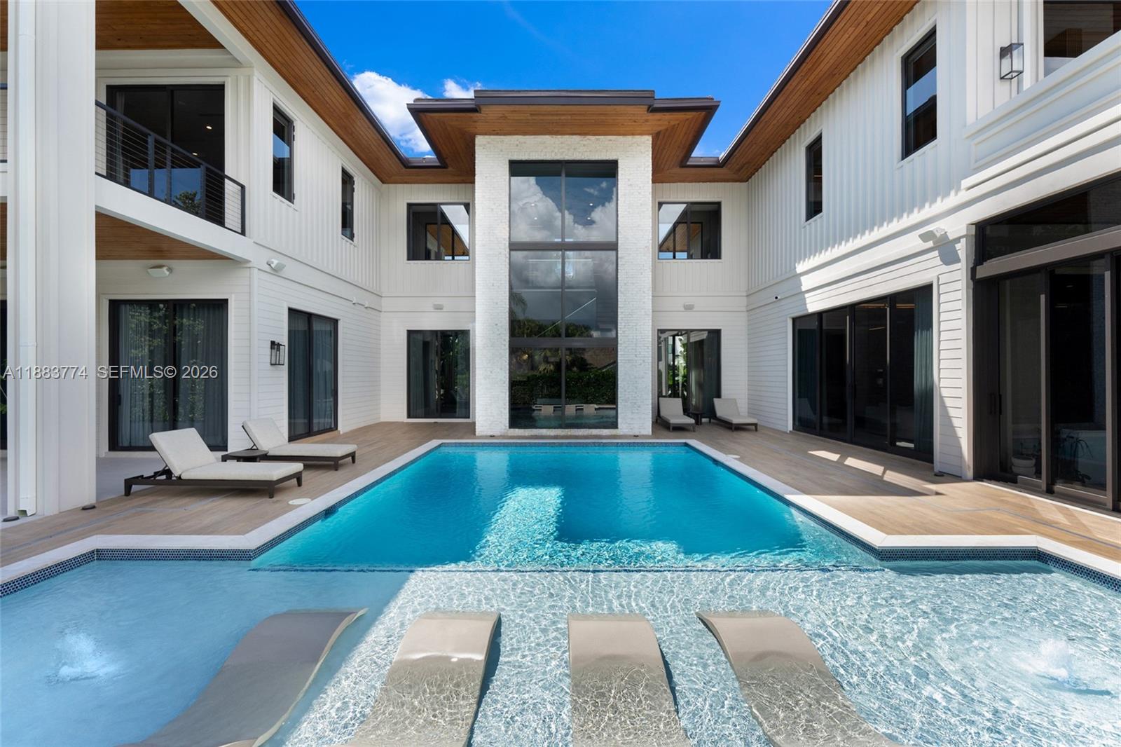 13120 Old Cutler Road Pinecrest, FL 33156 - Photo 42 of 56 a view of a house with pool table and chairs