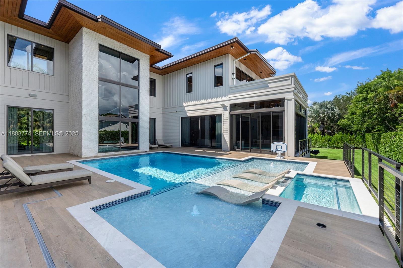 13120 Old Cutler Road Pinecrest, FL 33156 - Photo 43 of 58 a view of a house with backyard porch and sitting area