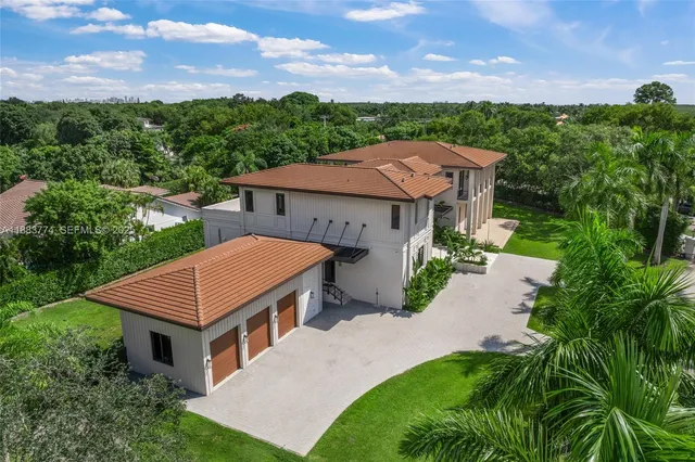 a view of a building with a yard