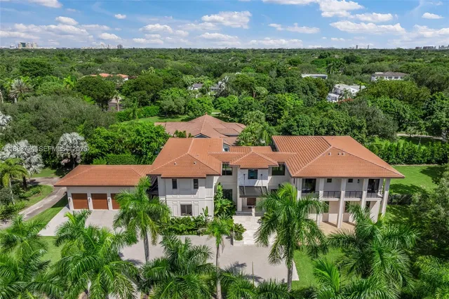 a view of pool with brick walls