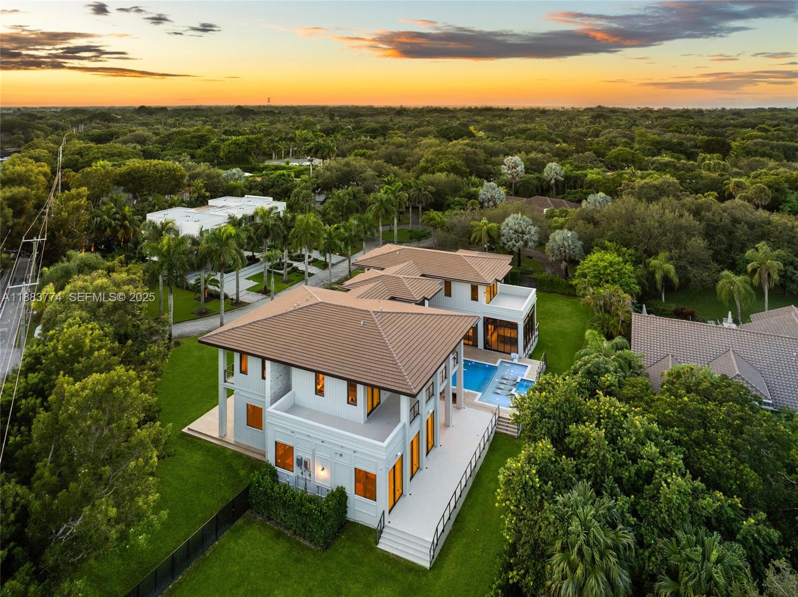 13120 Old Cutler Road Pinecrest, FL 33156 - Photo 56 of 58 an aerial view of a house with a yard