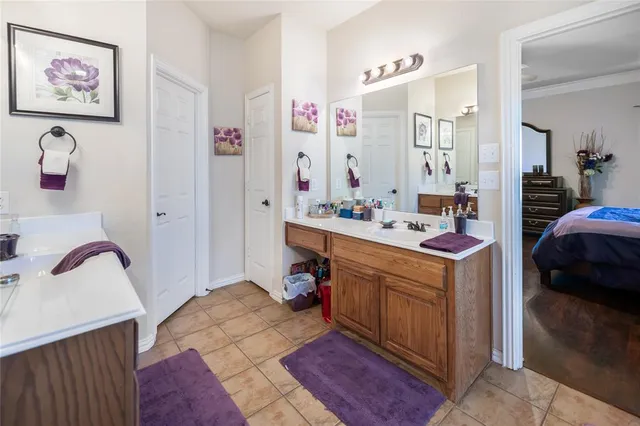 a bedroom with a bed and a cabinets