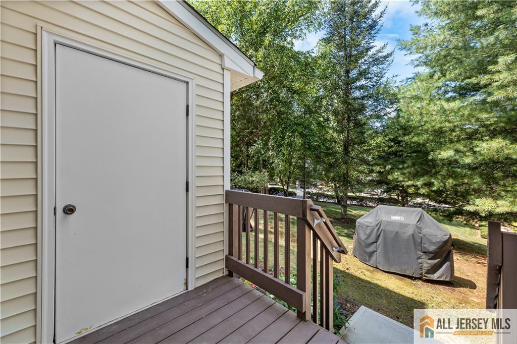 28 Garfield Way Princeton, NJ 08540 - Photo 21 of 39 a balcony with wooden floor and furniture