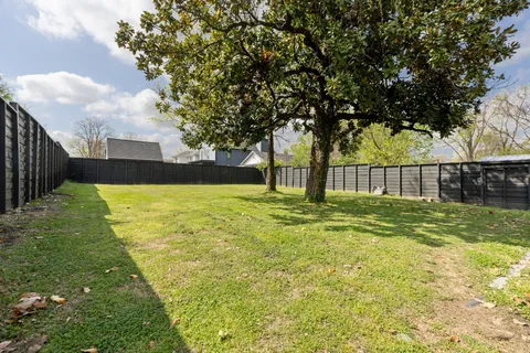 a view of a swimming pool with a garden
