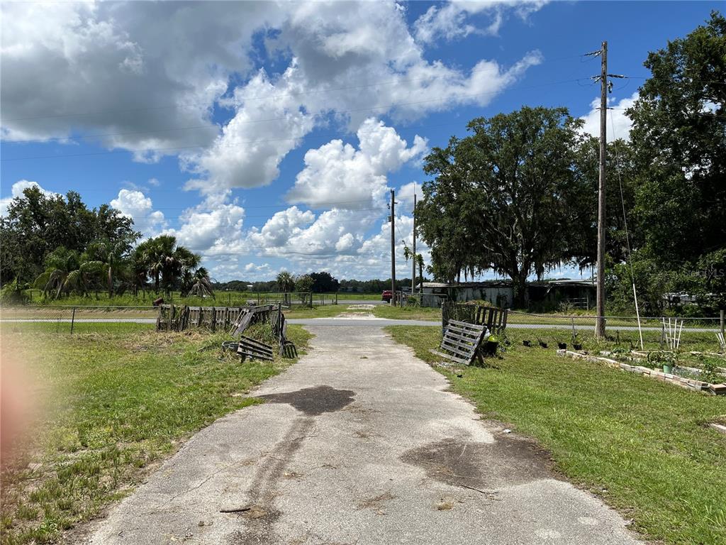 411 Alibrandi Road Leesburg, FL 34748 - Photo 43 of 44 a view of a lake