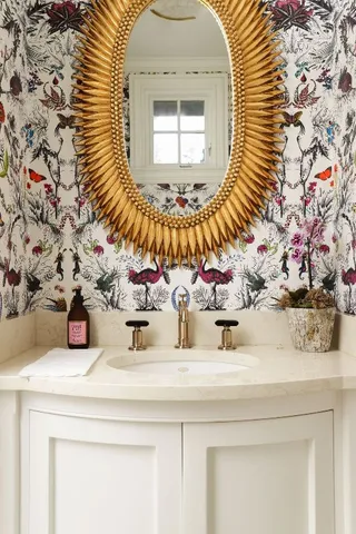 a bathroom with a sink and mirror