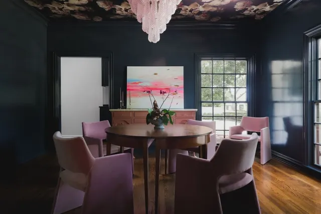 a view of a dining room with furniture window and outside view