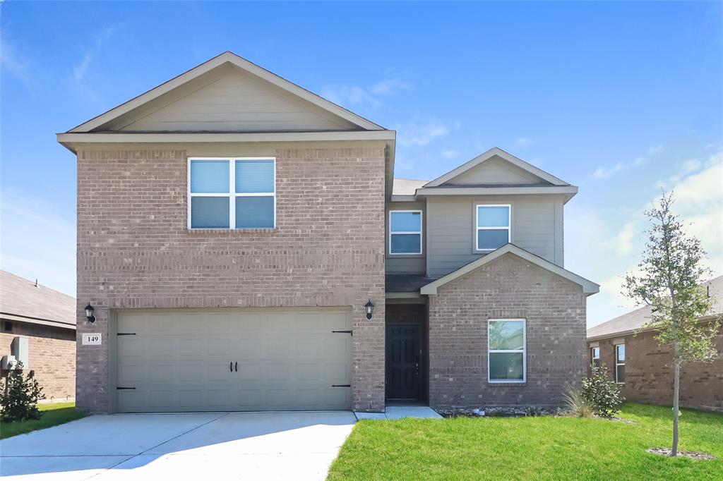 149 Switchback Hill Road Newark, TX 76071 - Photo 1 of 17 a front view of a house with garden