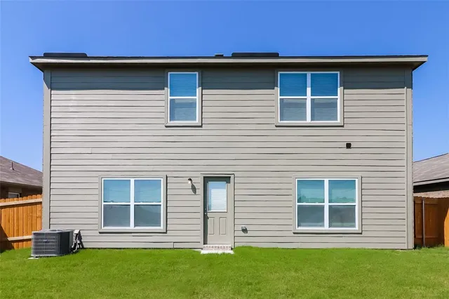 a brick house with a large windows