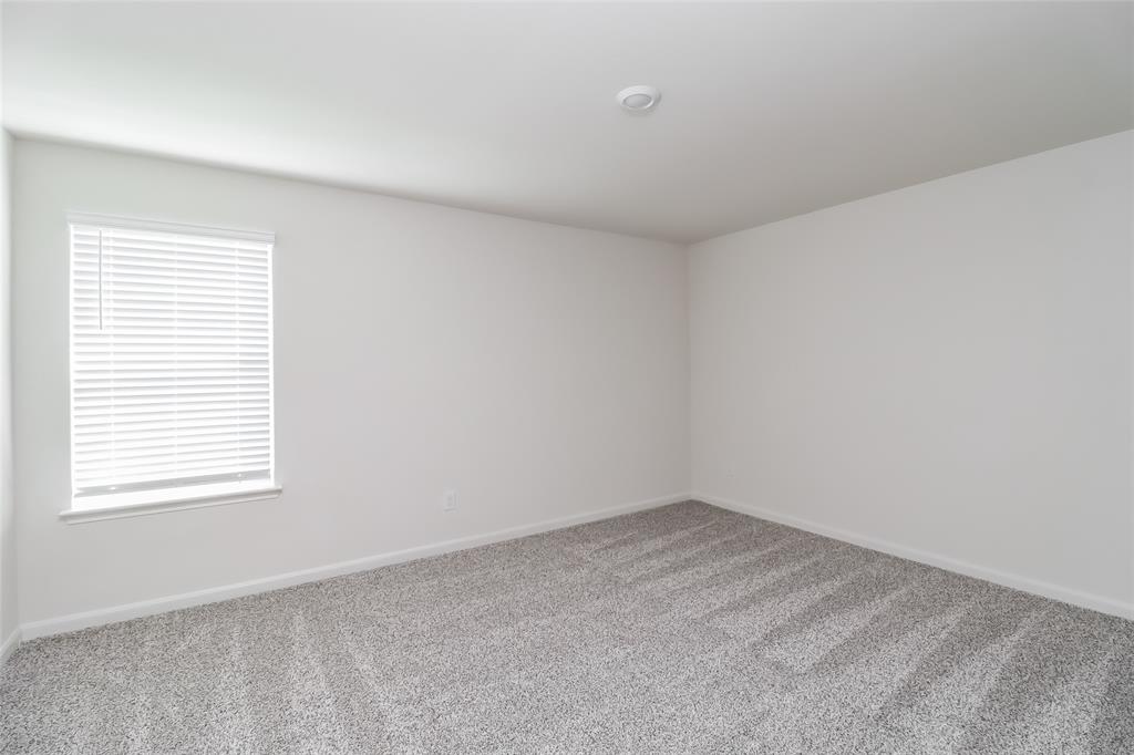 149 Switchback Hill Road Newark, TX 76071 - Photo 5 of 17 an empty room with a window