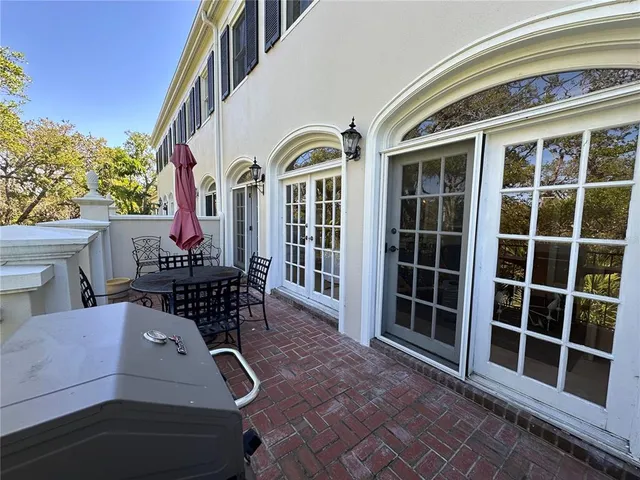 a view of balcony with furniture