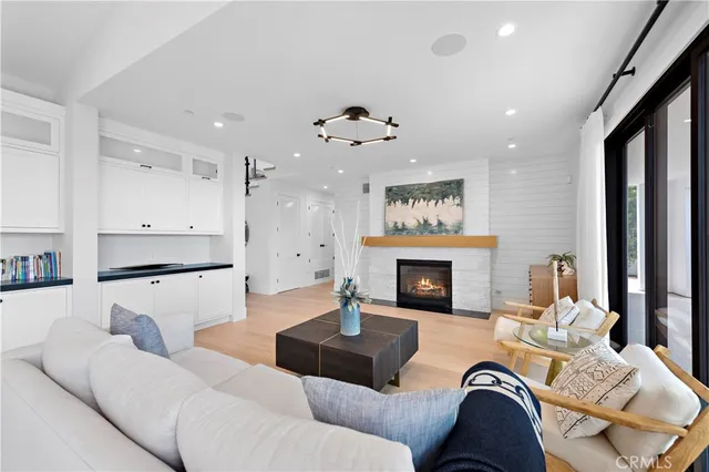 a large kitchen with a table and chairs