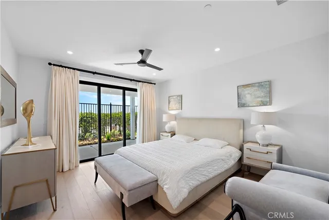 a bedroom with a bed and a table