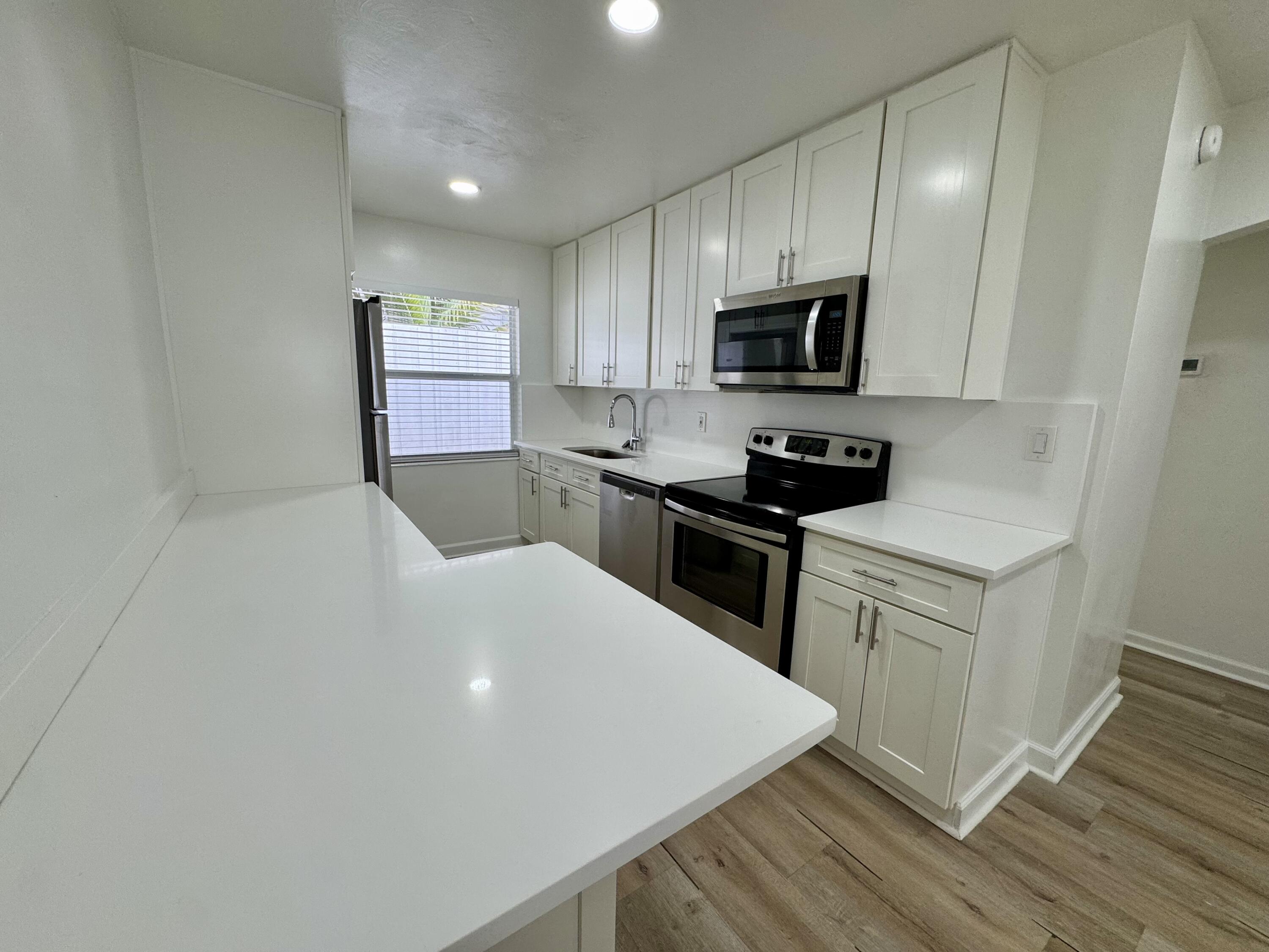 1235 Beach Road, Unit 2 Singer Island, FL 33404 - Photo 9 of 12 IMG_0259