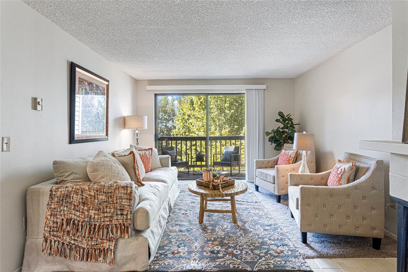 611 Southwest 5th Court, Unit A304 Renton, WA 98057 - Photo 2 of 23 a living room with furniture and a window
