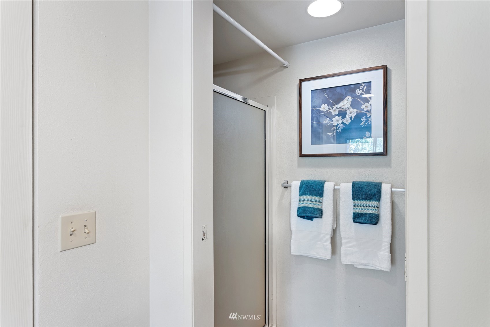611 Southwest 5th Court, Unit A304 Renton, WA 98057 - Photo 21 of 23 a picture of a wall with a elevator