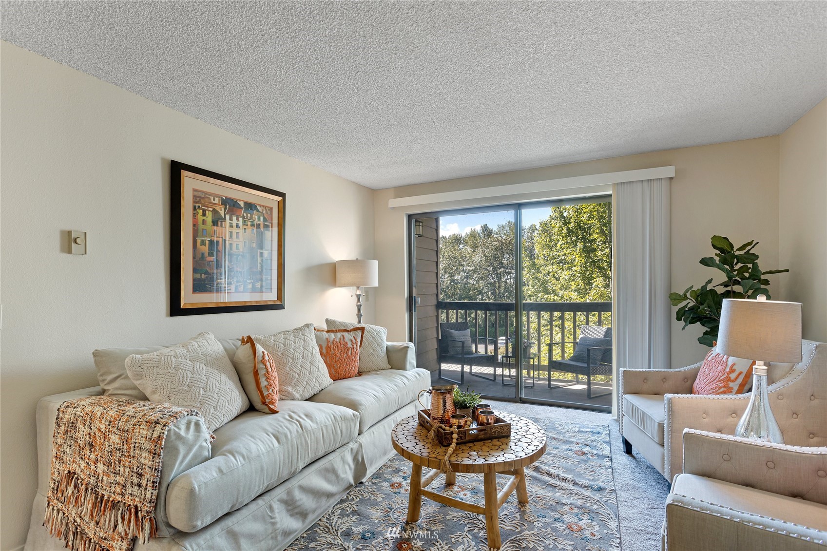 611 Southwest 5th Court, Unit A304 Renton, WA 98057 - Photo 3 of 23 a living room with furniture and a large window