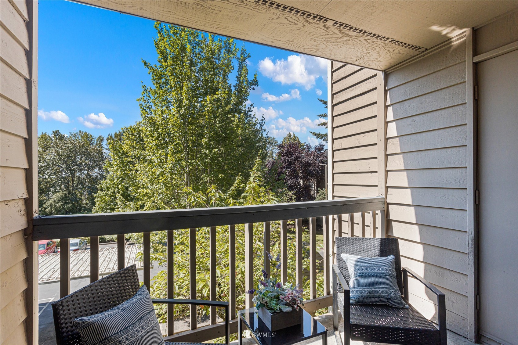 611 Southwest 5th Court, Unit A304 Renton, WA 98057 - Photo 4 of 23 a view of a balcony with chairs