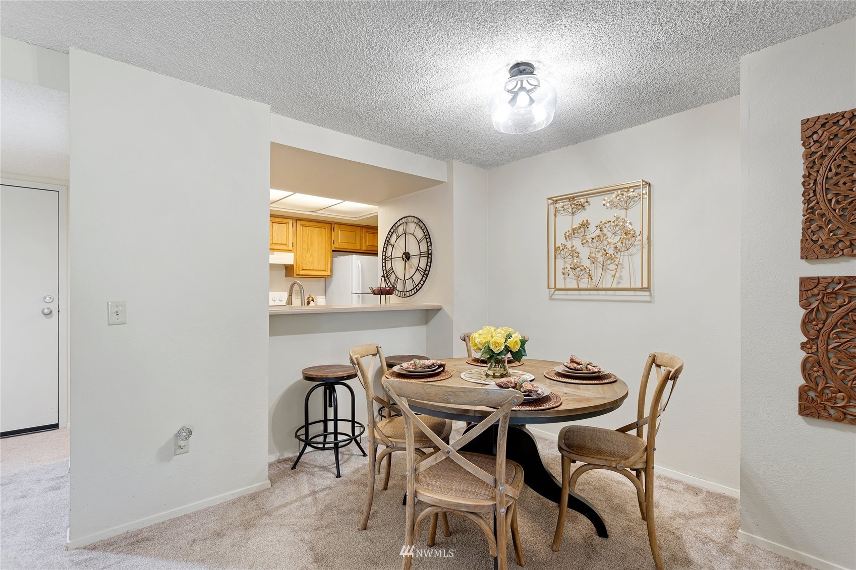 611 Southwest 5th Court, Unit A304 Renton, WA 98057 - Photo 7 of 23 a dining room with furniture and window