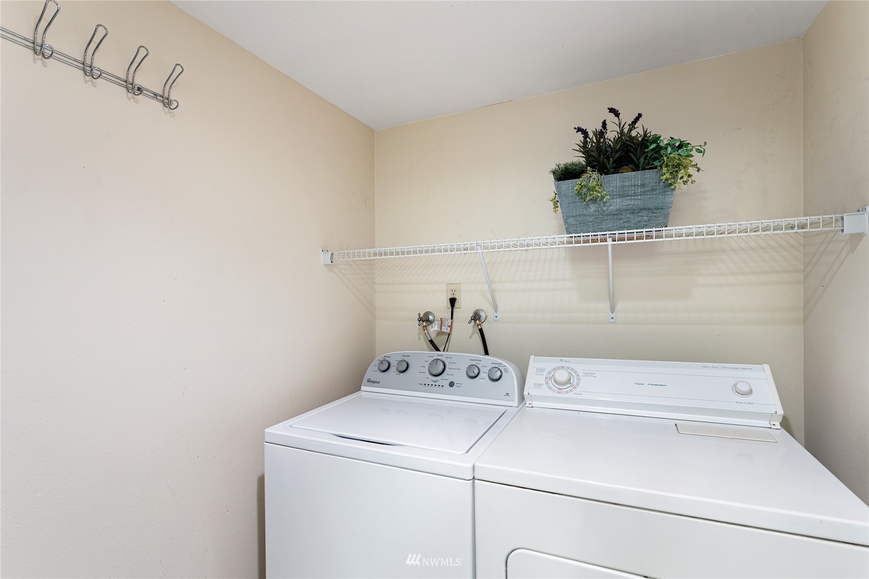 611 Southwest 5th Court, Unit A304 Renton, WA 98057 - Photo 10 of 23 a utility room with dryer and washer
