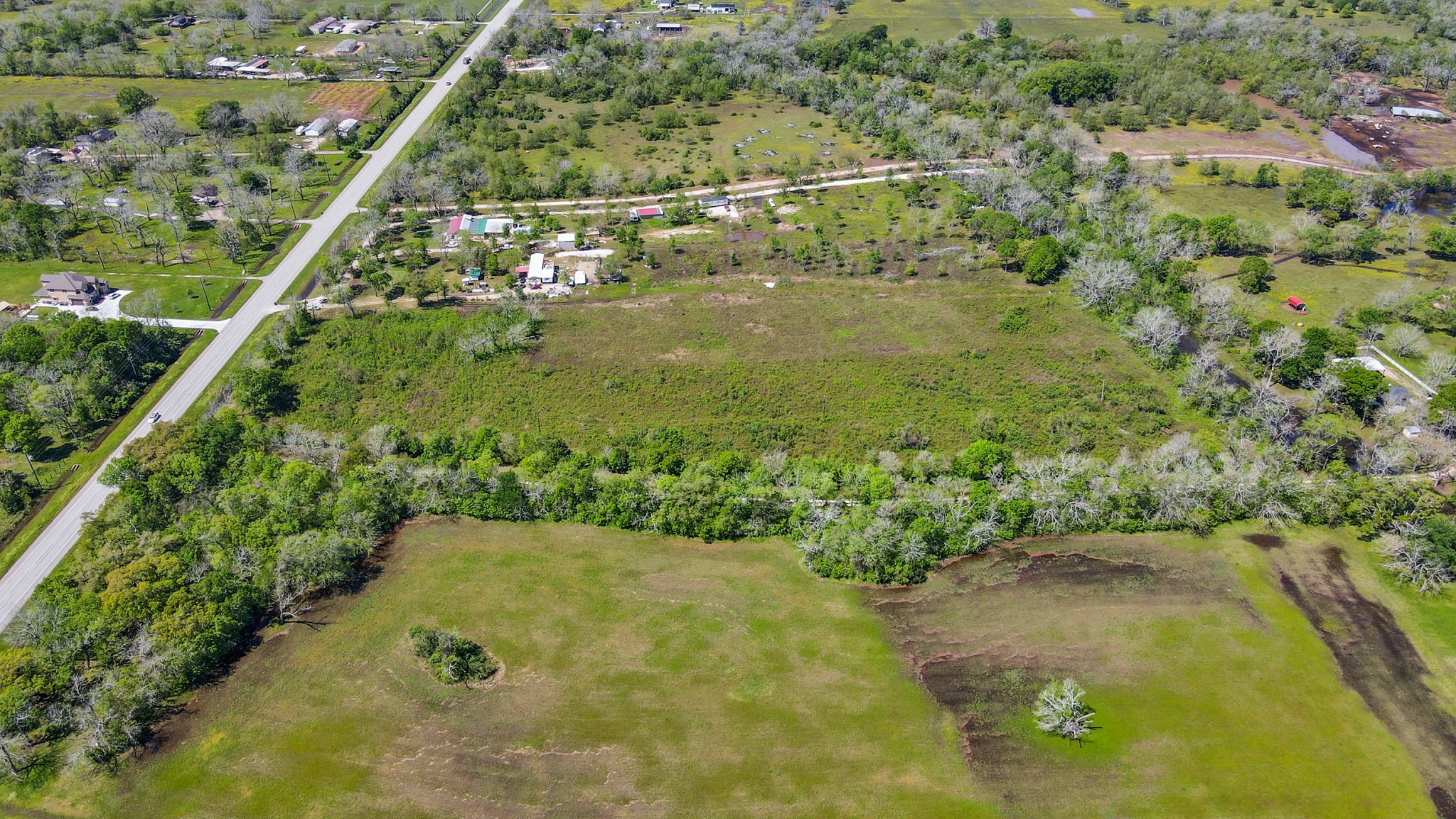 1720 West Fm 1462 Rosharon, TX 77583 - Photo 12 of 44 a view of a yard with plants