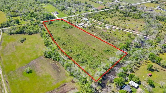 a view of a yard with a lake view