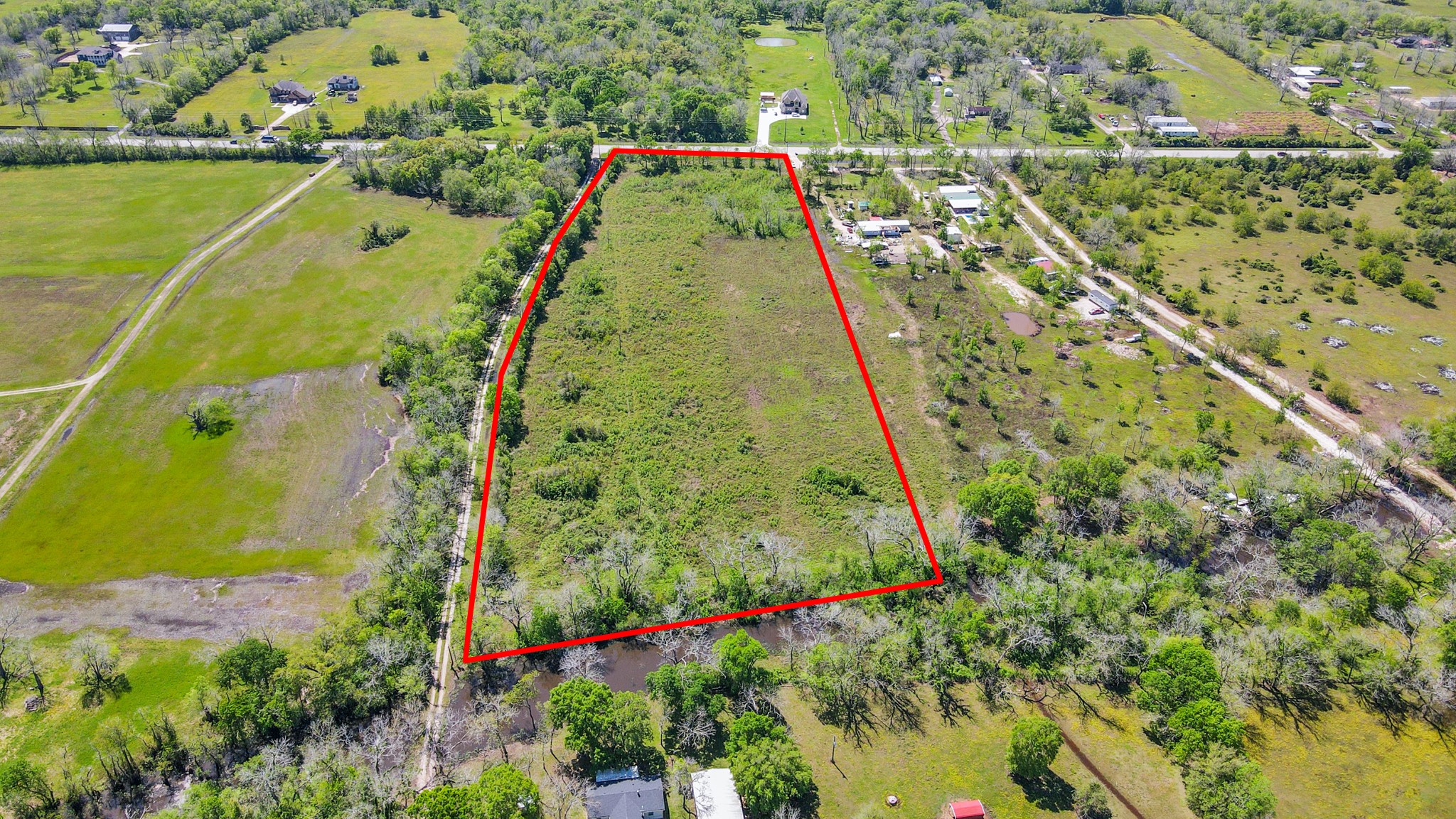 1720 West Fm 1462 Rosharon, TX 77583 - Photo 15 of 44 a view of a yard with a lake view