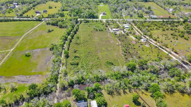 a view of a yard with an outdoor space