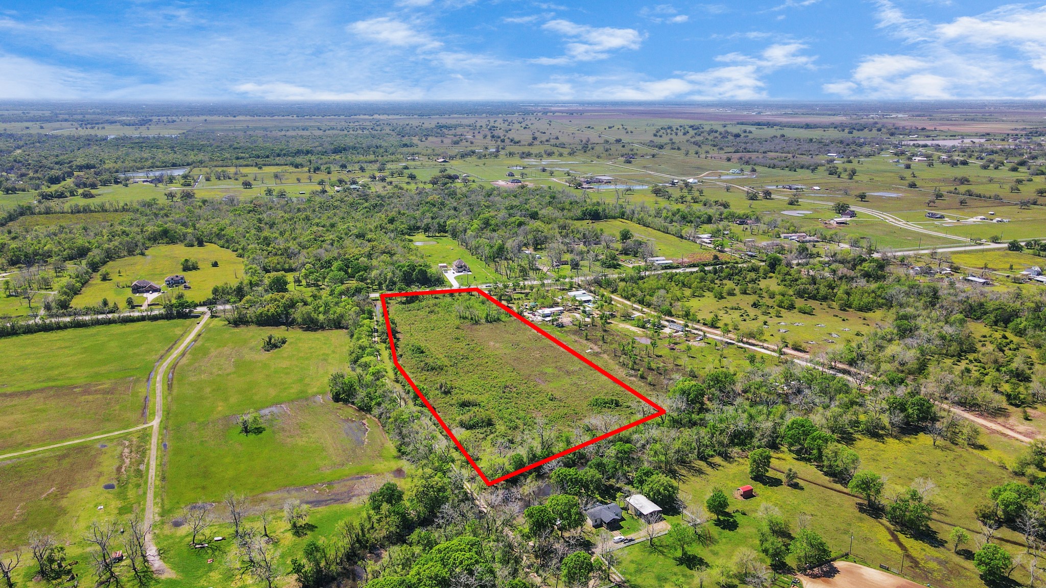 1720 West Fm 1462 Rosharon, TX 77583 - Photo 29 of 44 an aerial view of a residential houses with outdoor space and a lake view