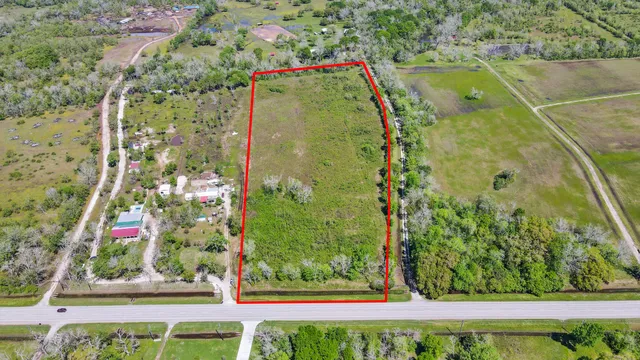 a view of a pool and an outdoor space