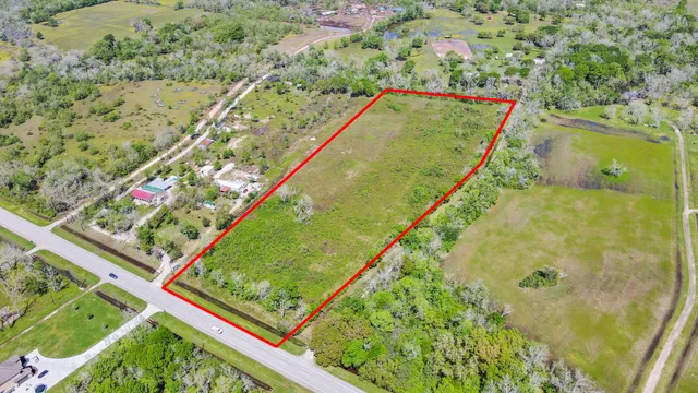 a view of statue in the middle of a garden