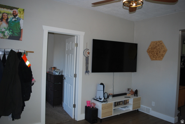 116 North 3rd Street Tooele, UT 84074 - Photo 6 of 45 Wood-finish flooring, ceiling fan with integrated lighting, and a white interior door