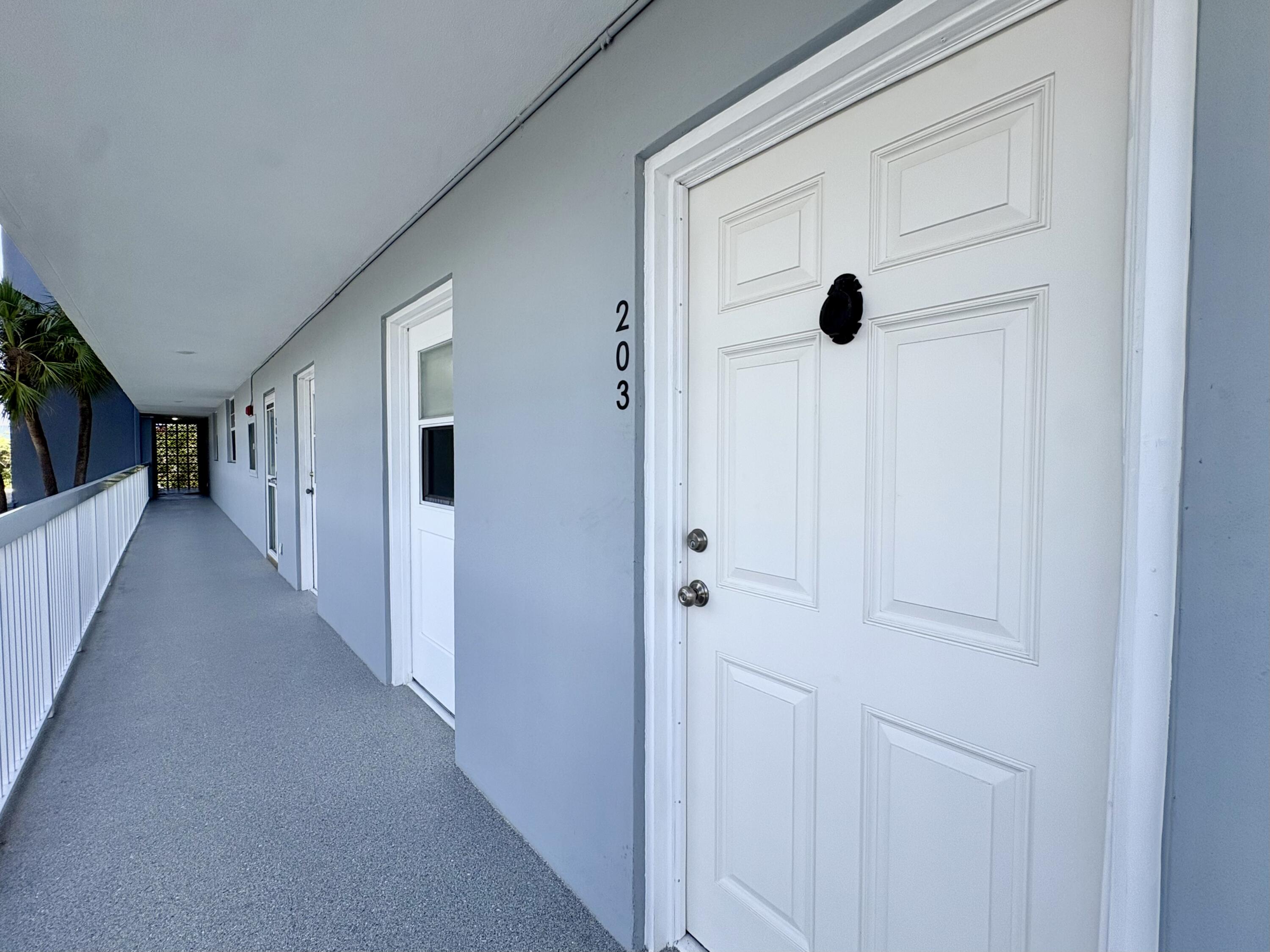 5700 Northwest 2nd Avenue, Unit 203 Boca Raton, FL 33487 - Photo 4 of 29 UNIT ENTRANCE