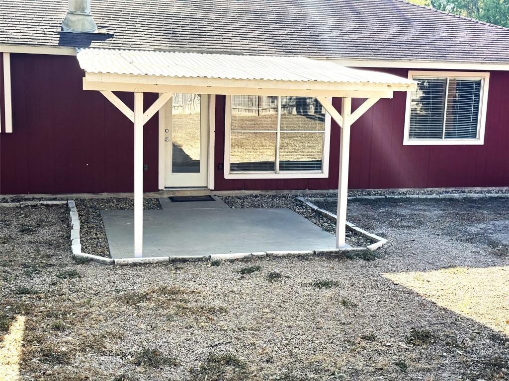 1412 Quail Run Road Pflugerville, TX 78660 - Photo 14 of 16 a view of a backyard of a house