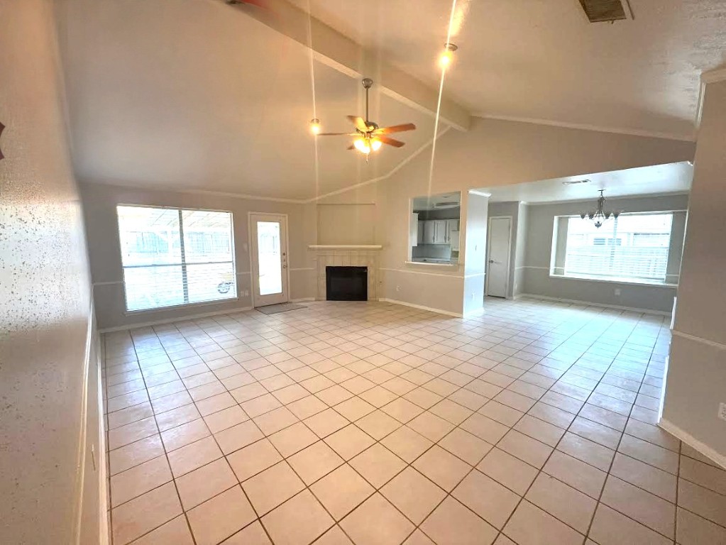 1412 Quail Run Road Pflugerville, TX 78660 - Photo 5 of 16 wooden floor in an empty room with a window
