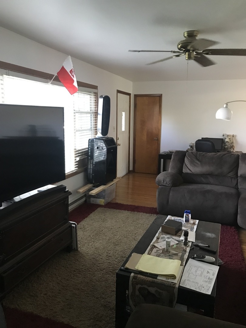 17204 Altenburg Road Harvard, IL 60033 - Photo 14 of 22 a living room with furniture