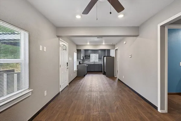 a view of entryway with wooden floor